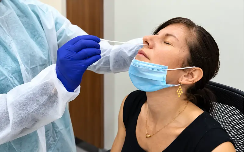 COVID-19 PCR testing at Mina Rashid Screening Center